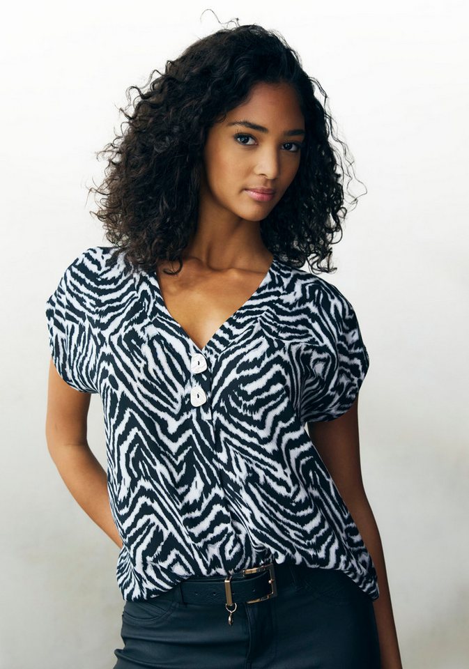 LASCANA Schlupfbluse mit Zebraprint und tiefem V-Ausschnitt mit modischen Knöpfen luftige Kurzarmbluse, lockeres Blusenshirt, Bluse mit Animaldruck