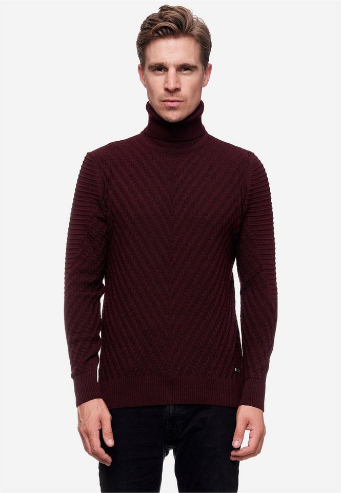 Rusty Neal Rollkragenpullover in stilvollem Feinstrick
